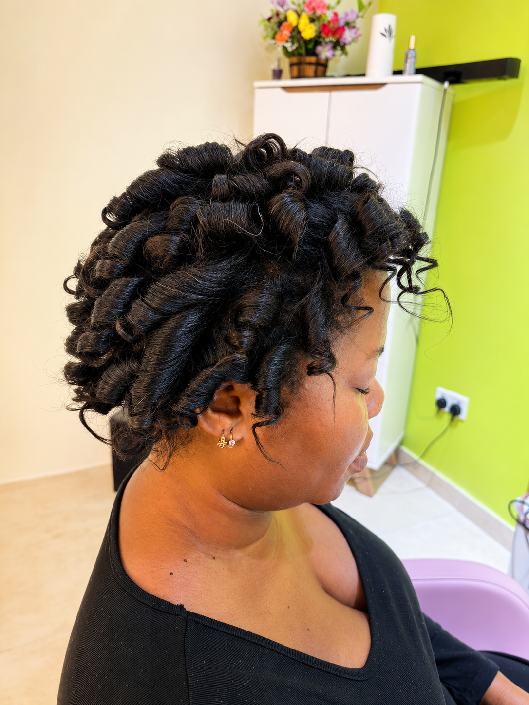 Elegant curled updo hair styling